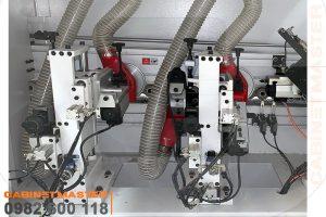 Cụm xén trên dưới máy dán cạnh 9 chức năng keo PUR