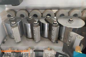 Cụm rulo ép nẹp máy dán cạnh 9 chức năng keo PUR
