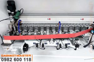 Băng tải cao su ép nẹp máy dán cạnh noline keo 2 thành phần